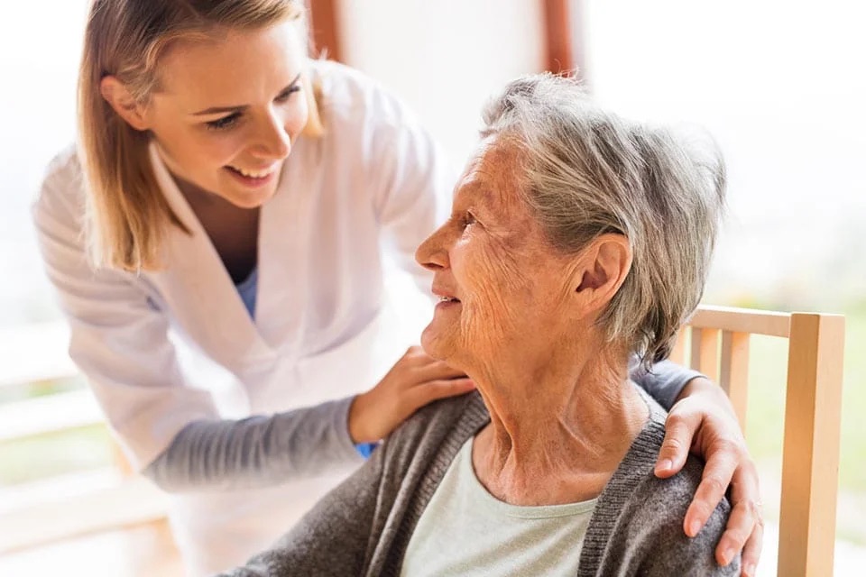 Caregiver with senior patient